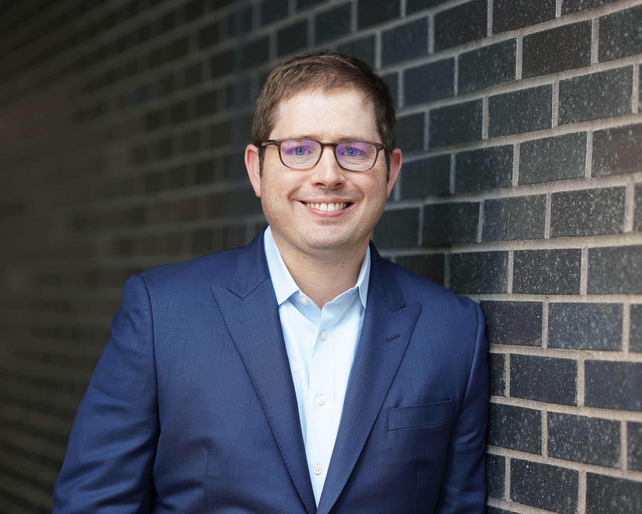 Headshot of Denver Board Member Andrew Treaster