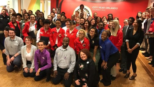 members of the Universal Orlando Resort Human Resources take a group picture with the Orlando corps