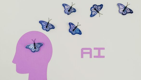 Simple illustration of human head with butterflies flying out like ideas. Next to the text "AI."